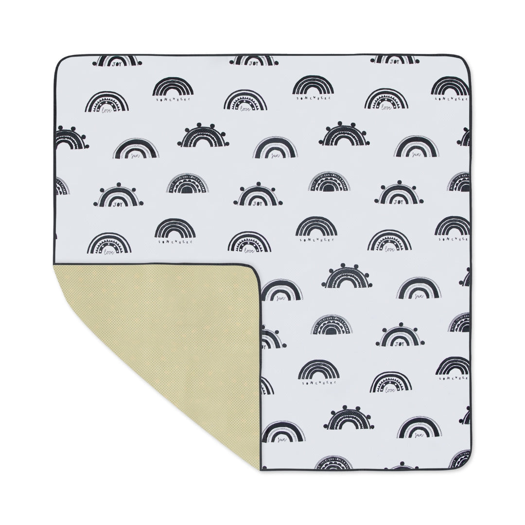 Black and white rainbow patterned splat mat water resistant floor cover for messy play