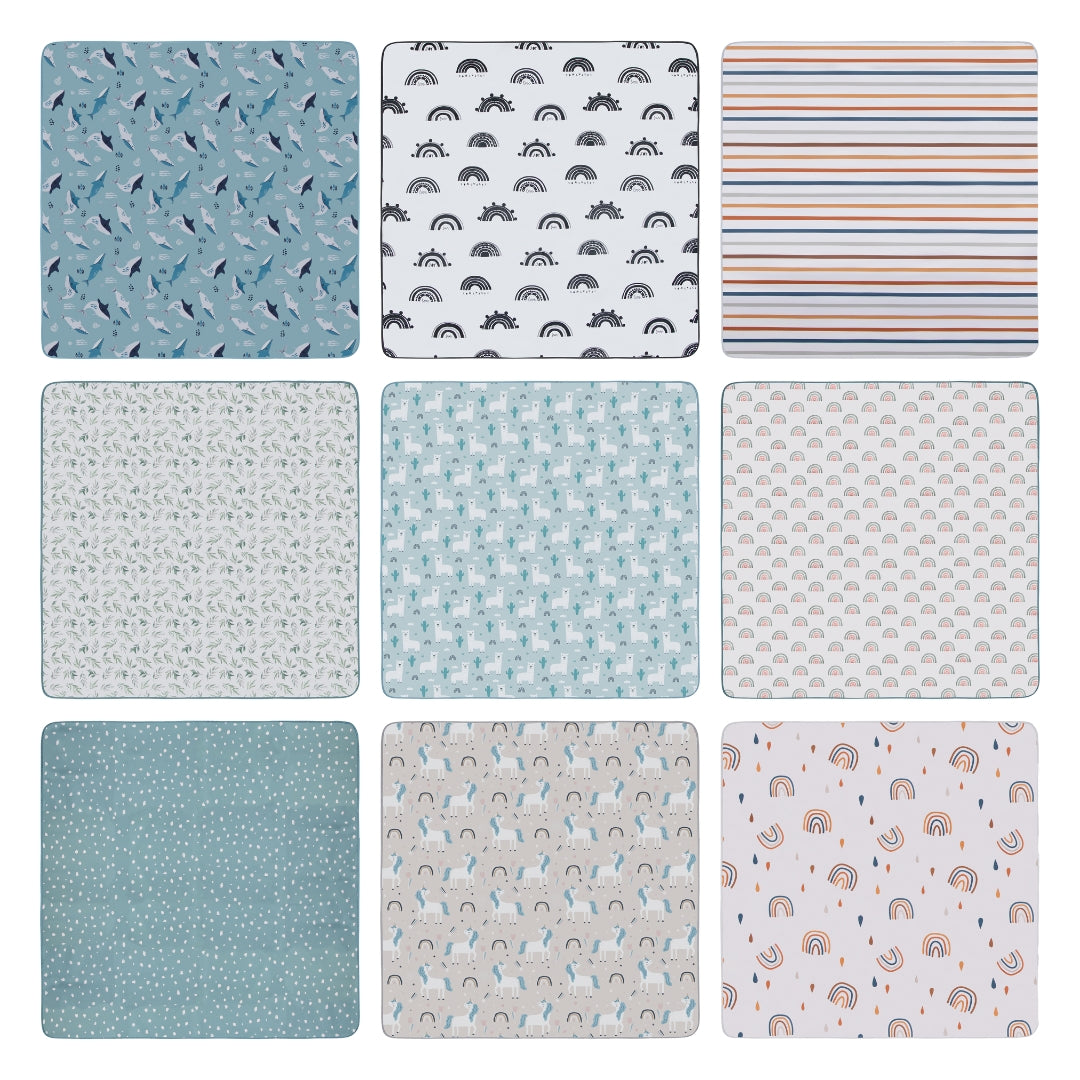 Nine patterned fabric squares on water resistant splat mat floor cover for playroom use