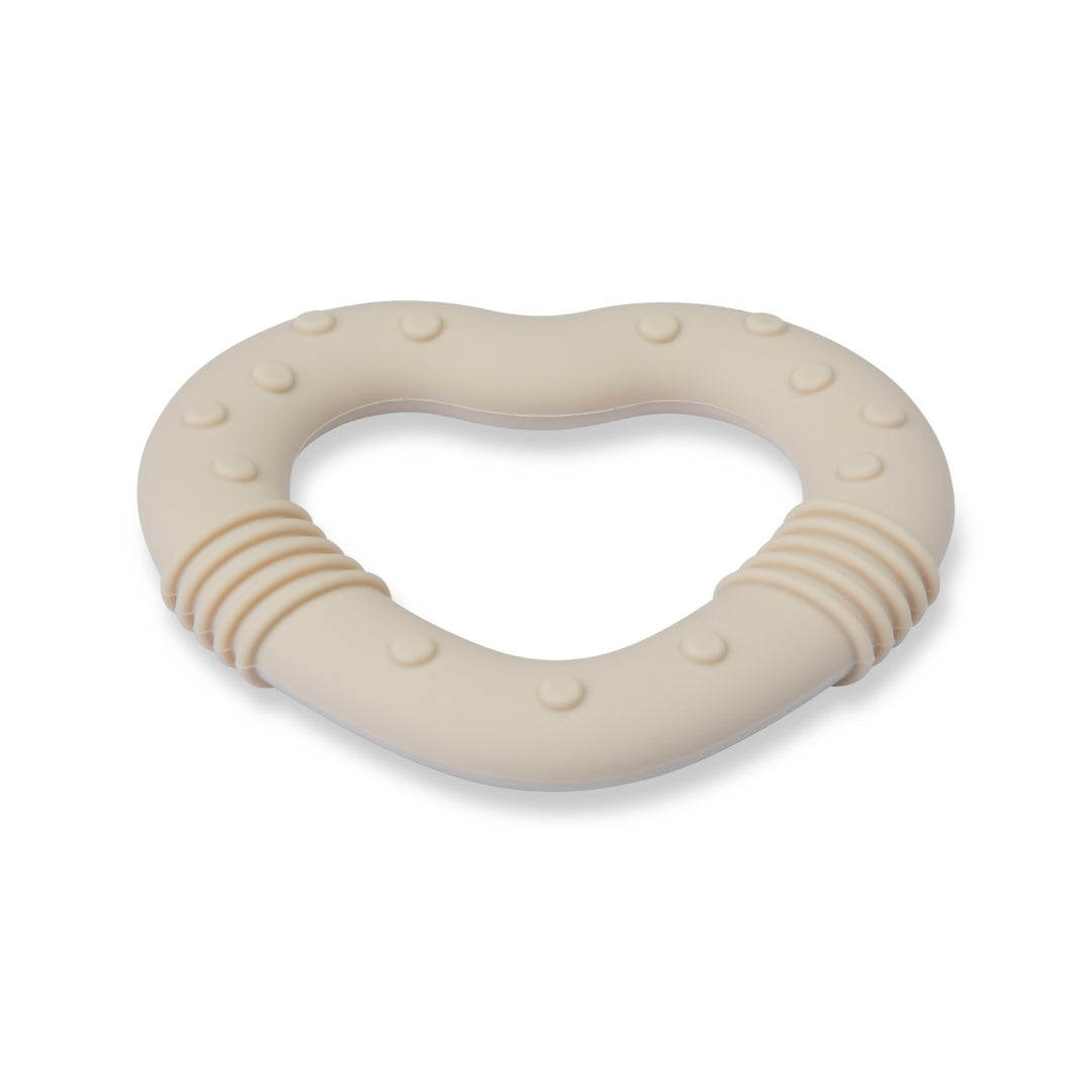 Beige silicone baby teether in love heart shape with textured surface for soothing gums