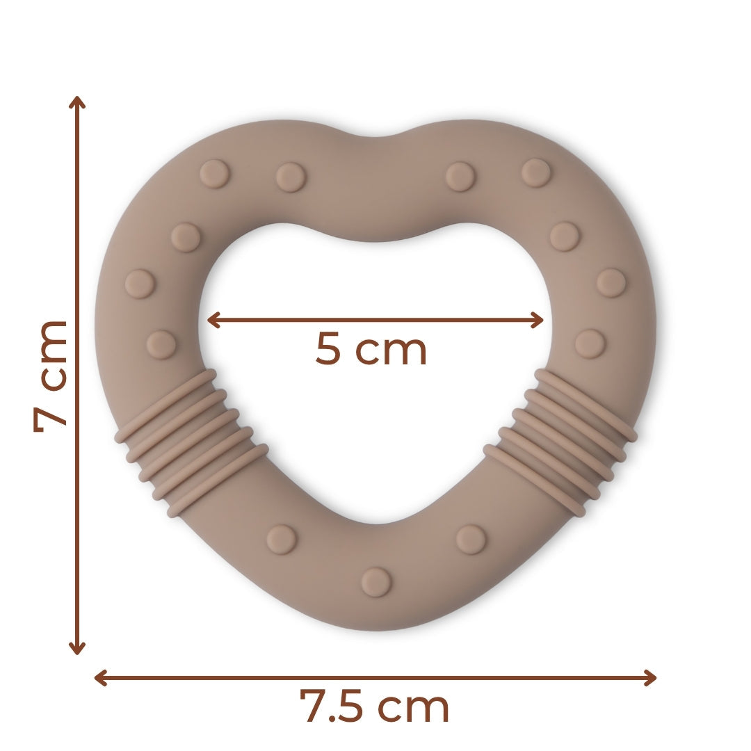 Heart-shaped silicone baby teether with textured bumps for soothing comfort