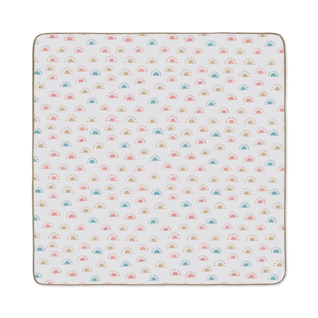 Square patterned baby blanket on Splat Mat Messy Floor Cover, water resistant floor cover